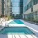 a swimming pool outside of a building