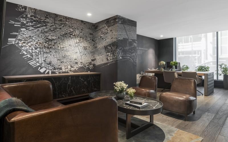 a room with a large stone wall