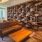 a living room with a wall of plates