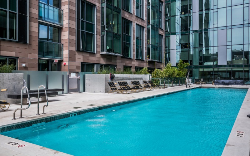 a pool in front of a building