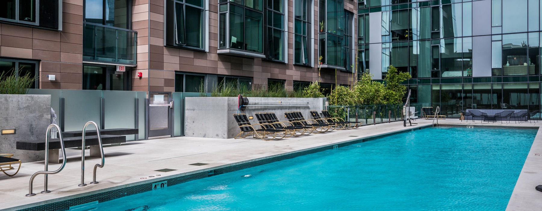 a pool in front of a building