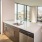 a kitchen with a large window