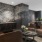 a room with a large stone wall